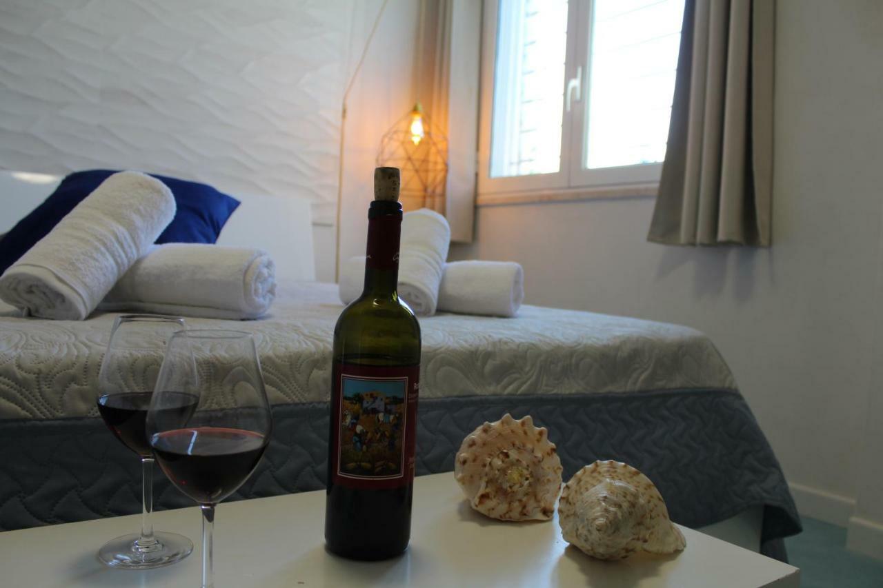 Acquamarina House On The Beach Apartment อัลกาโมมารีนา ภายนอก รูปภาพ