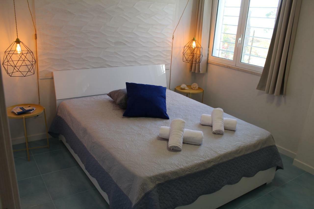 Acquamarina House On The Beach Apartment อัลกาโมมารีนา ภายนอก รูปภาพ