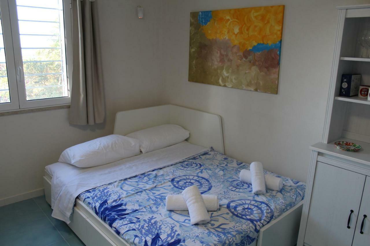 Acquamarina House On The Beach Apartment อัลกาโมมารีนา ภายนอก รูปภาพ
